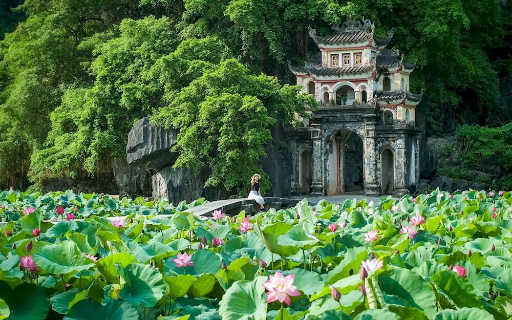 Bich Dong Pagoda nestles within the mountains, exuding an ancient and sacred charm 
